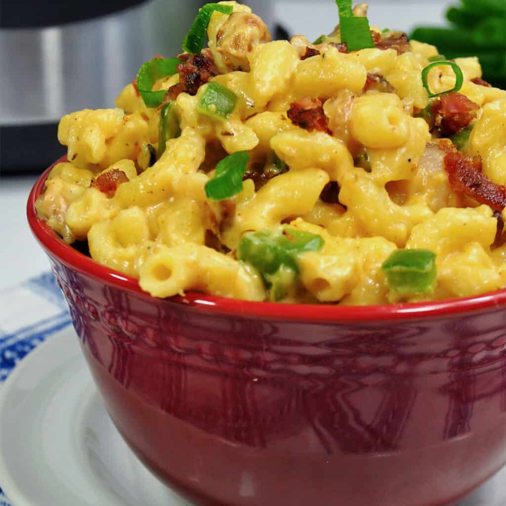 Jalapeno popper mac & cheese made in the instant pot and put into red bowl