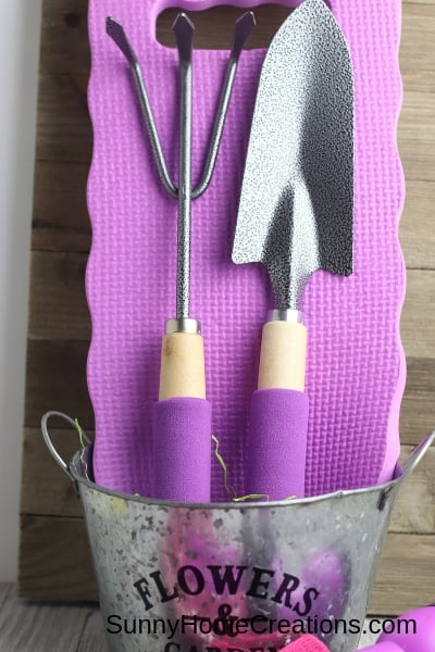 Gardening gift basket with kneeler pad trowel hand tools